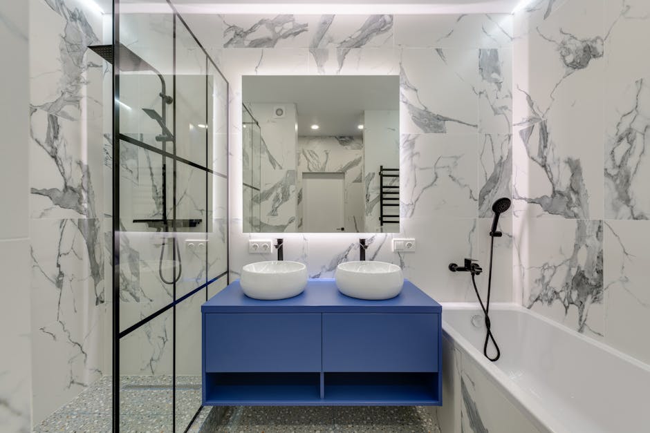 Bathroom remodeling contractor reviewing plans